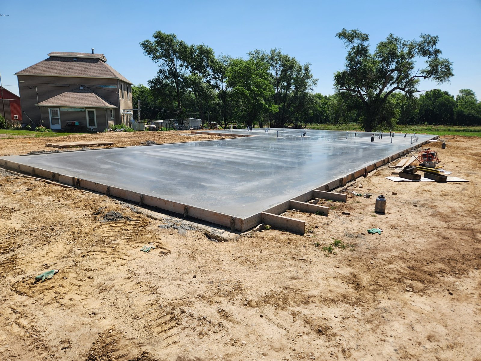 Freshly poured and finished concrete flatwork slab